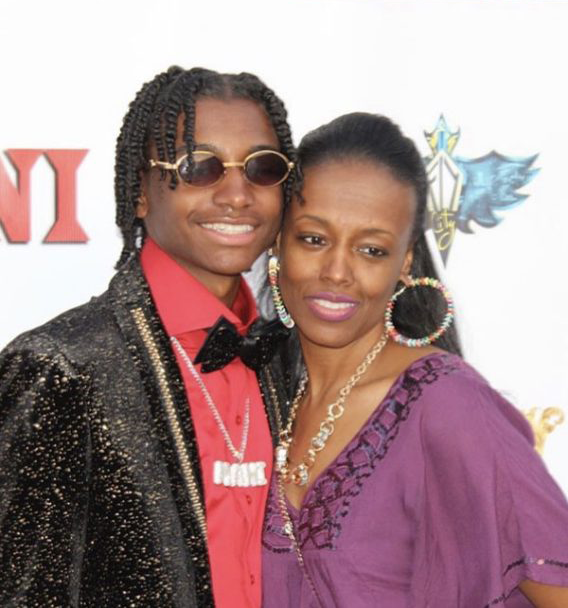 A man and woman posing together at an event. A man and woman posing together at an event.