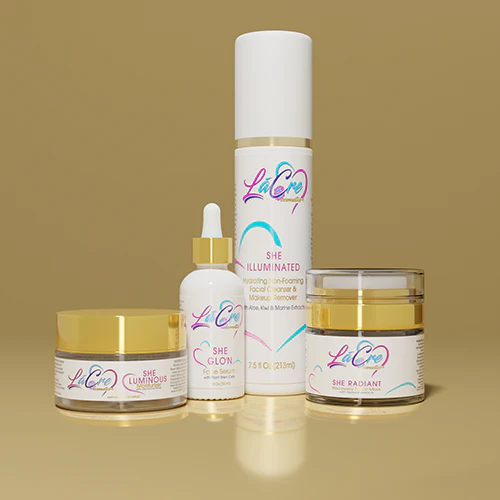 A collection of skincare products with white and gold packaging on a beige background. A collection of skincare products with white and gold packaging on a beige background.