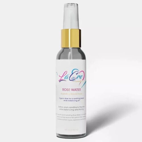 Elegant spray bottle with a gold cap and pastel label design.