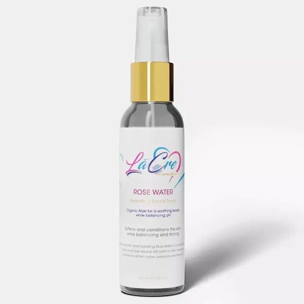 Elegant spray bottle with a gold cap and pastel label design.